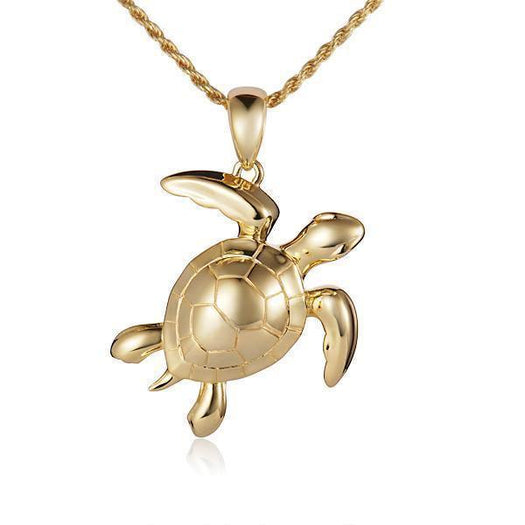 The picture shows a 14K yellow gold sea turtle pendant.