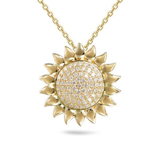 In this photo there is a yellow gold sunflower pendant with diamonds.