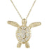 The picture shows a 14K yellow gold sea turtle pendant with pavé diamonds.