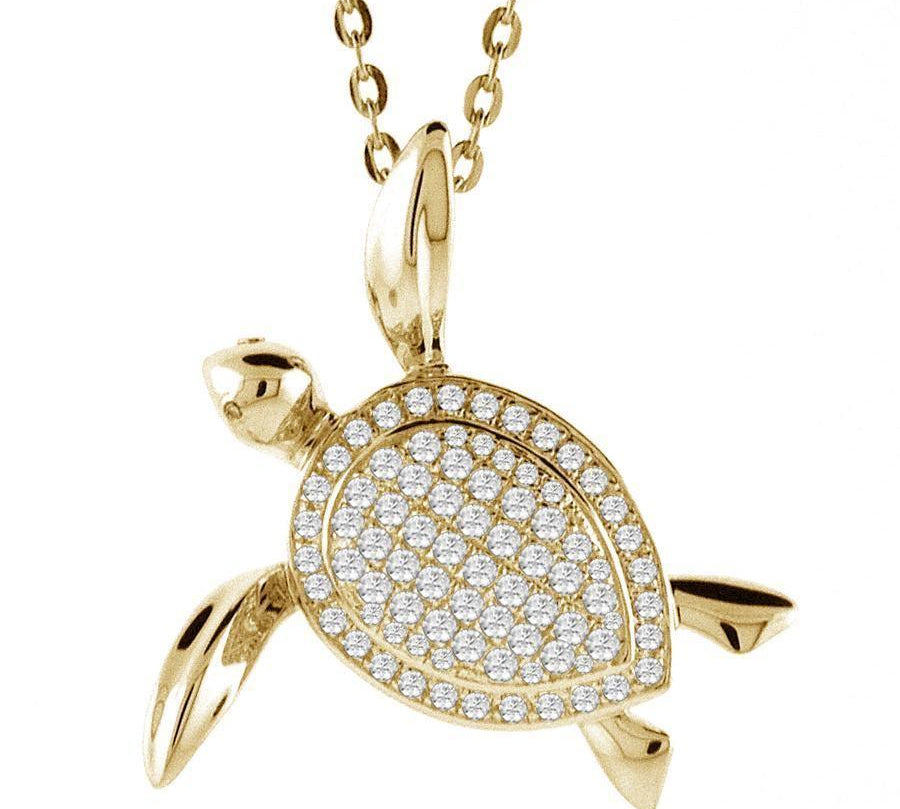 The picture shows a 14K yellow gold sea turtle pendant with diamonds.