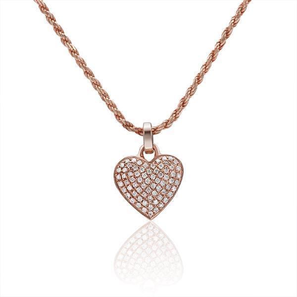 The picture shows a 14K rose gold pavé heart pendant with diamonds.