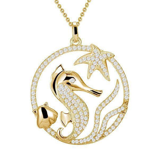 The pitcure shows a 14K yellow gold sea life pendant featuring a starfish, seahorse, sea shell, and seaweed designs with diamonds.