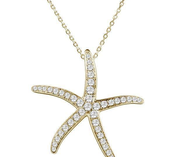 The picture shows a large 14K yellow gold sea star pendant with diamonds.