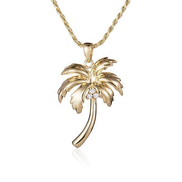 In this photo there is a yellow gold palm tree necklace with three diamond coconuts.
