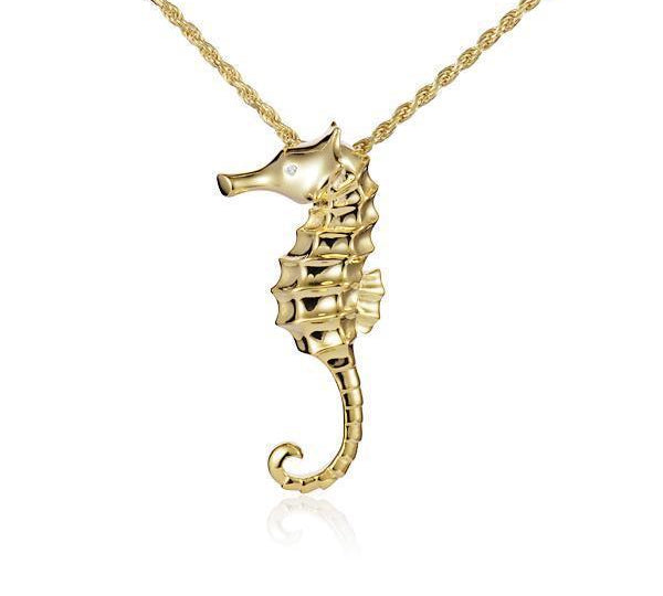 The picture shows a 14K yellow gold seahorse pendant with a diamond.