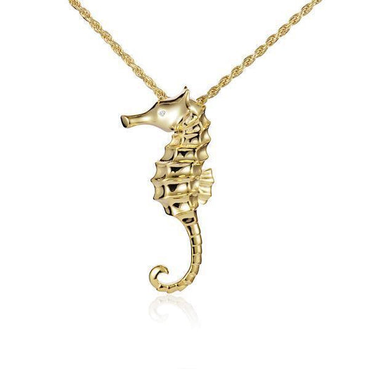 The picture shows a 14K yellow gold seahorse pendant with a diamond.