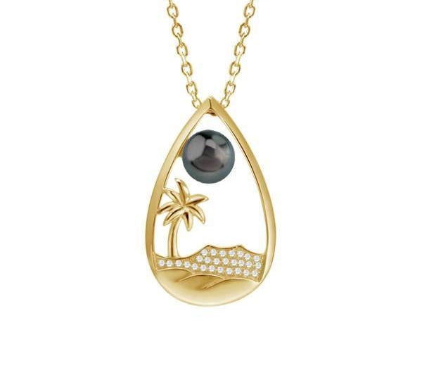 In this photo there is a yellow gold teardrop pendant with a palm tree, diamond head, diamonds, and one dark pearl.