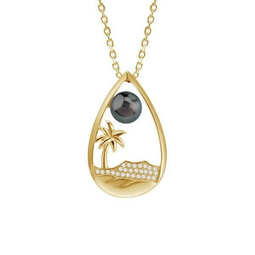 In this photo there is a yellow gold teardrop pendant with a palm tree, diamond head, diamonds, and one dark pearl.
