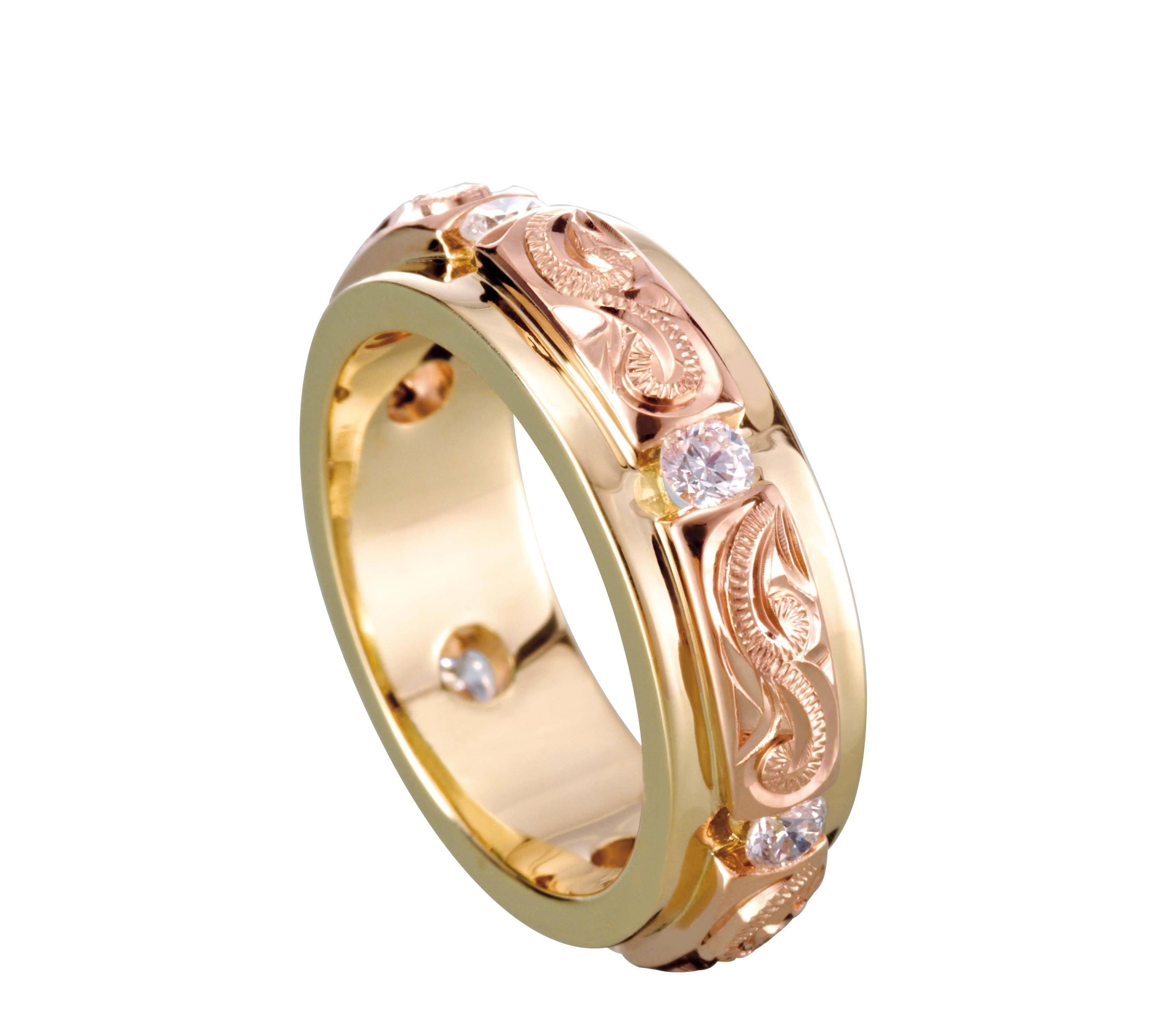 The picture shows a 14K yellow and rose gold two-tone infinity ring with diamonds and hand-engravings.