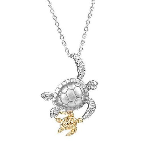 The picture shows a 14K two-tone white and yellow gold pendant featuring two sea turtles.