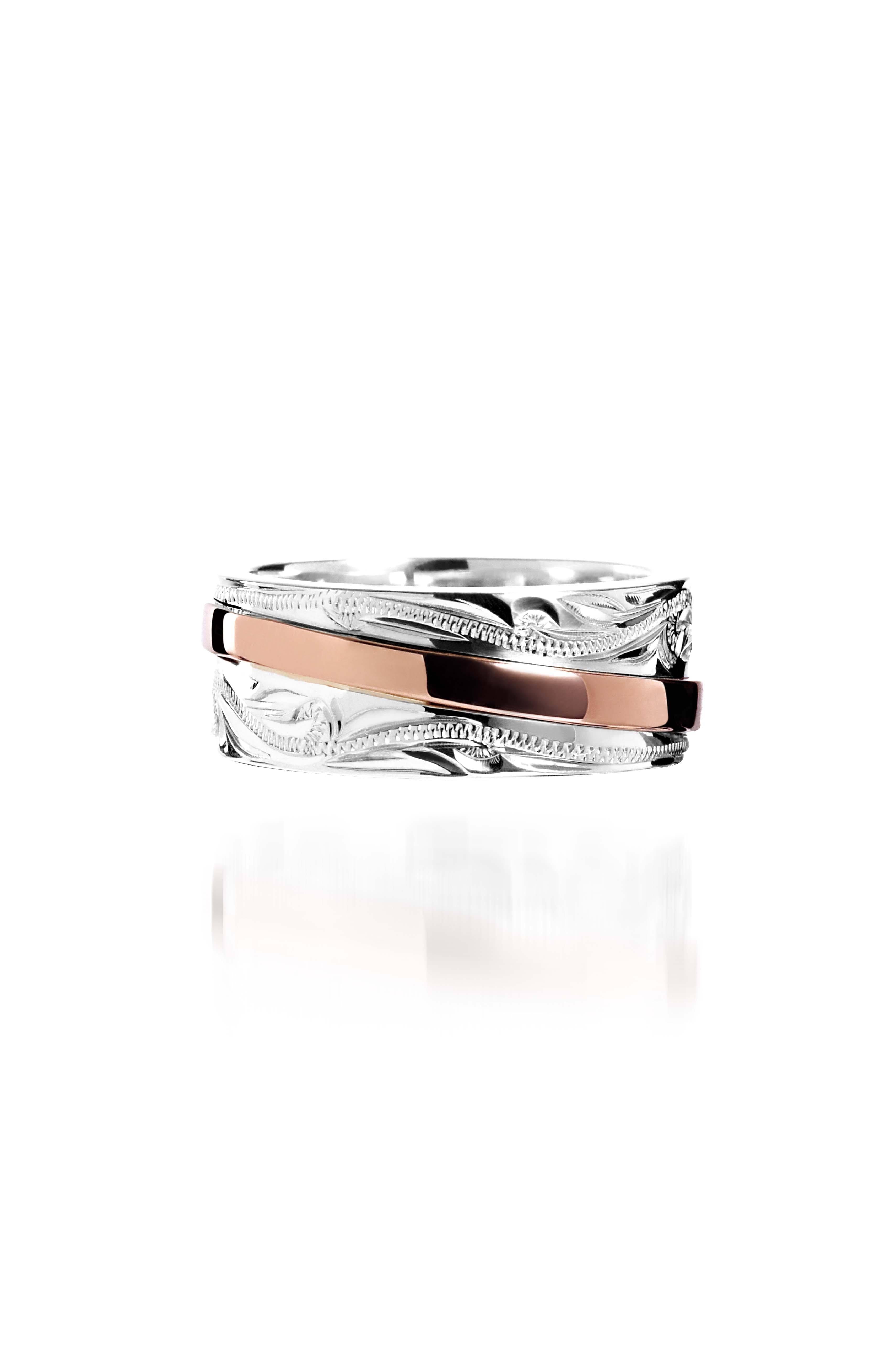 The picture shows a two-tone 925 sterling silver and 14K rose gold belted ring with hand-engravings.