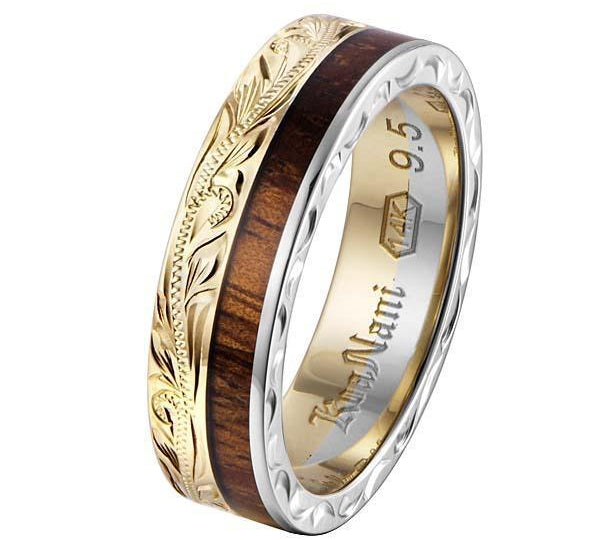 In this photo there is a white and yellow gold two-tone koa wood ring with scroll hand engravings.