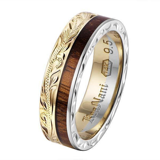 In this photo there is a white and yellow gold two-tone koa wood ring with scroll hand engravings.