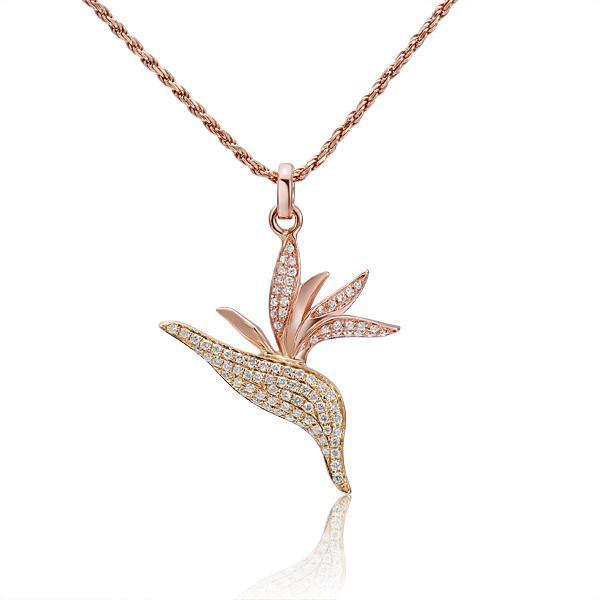 In this photo there is a rose and yellow gold two-tone bird of paradise pendant with diamonds.