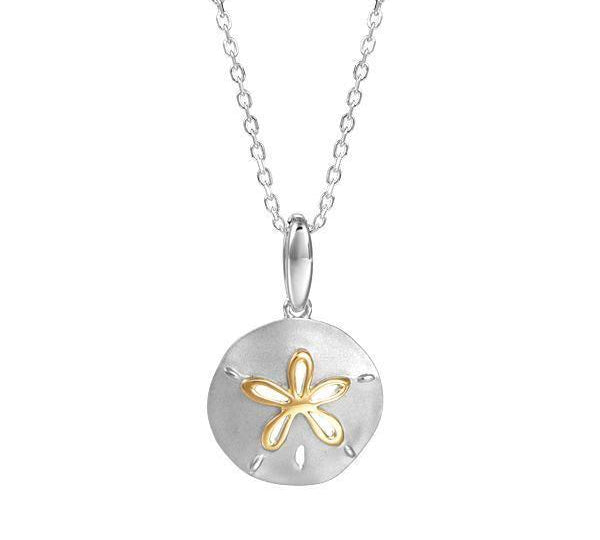 The picture shows a 14K white and yellow gold two-tone cut out sand dollar pendant.