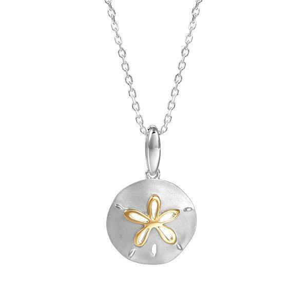 The picture shows a 14K white and yellow gold two-tone cut out sand dollar pendant.