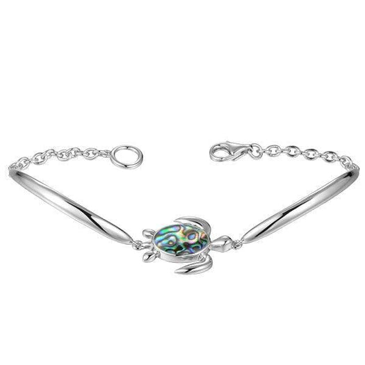 Sterling silver sea turtle bracelet, detailed with an abalone shell. 