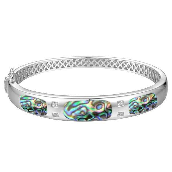 Sterling silver bangle featuring three inlayed rectangles of Abalone shell.