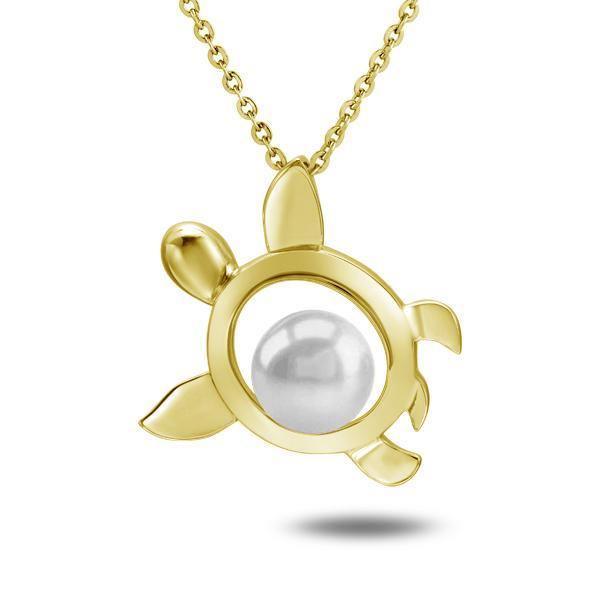 In this photo there is a yellow gold sea turtle pendant with one white pearl.