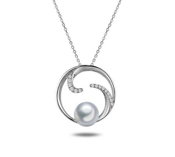 In this photo there is a white gold circle pendant with diamonds and one white Akoya pearl.