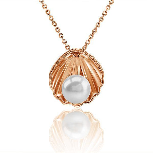In this photo there is a rose gold oyster shell pendant with a white Akoya pearl.