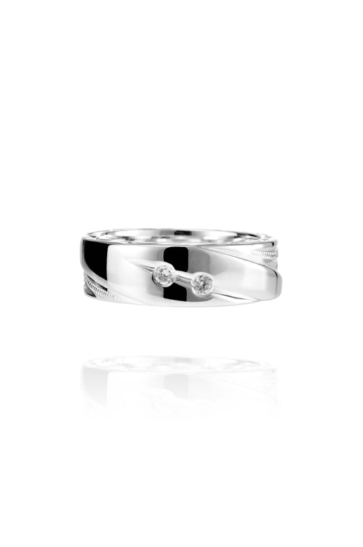 The picture shows a 925 sterling silver ring with diamonds and hand-engravings.