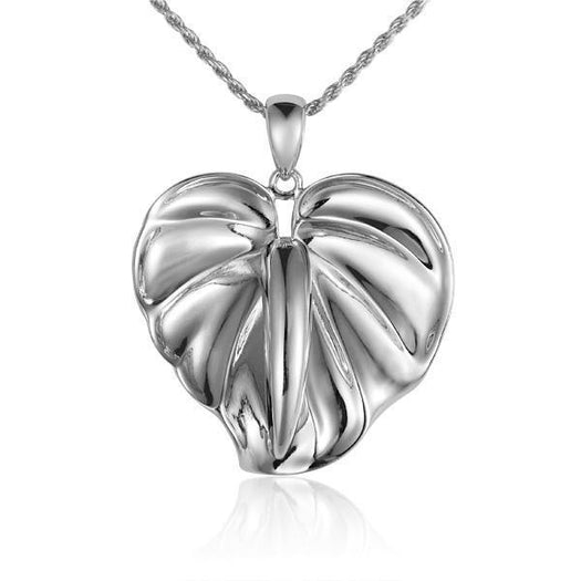 In this photo there is a white gold anthurium flower pendant.