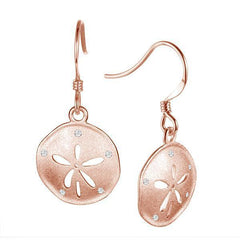 This picture shows a pair of 14k rose gold sand dollar hook earrings with diamonds.