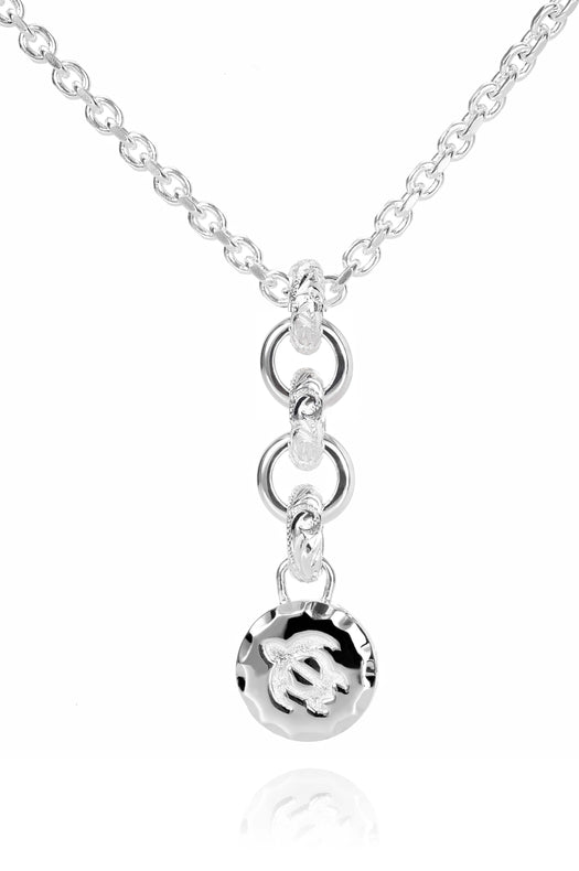 The picture shows a 925 sterling silver petroglyph pendant with a sea turtle engraving.