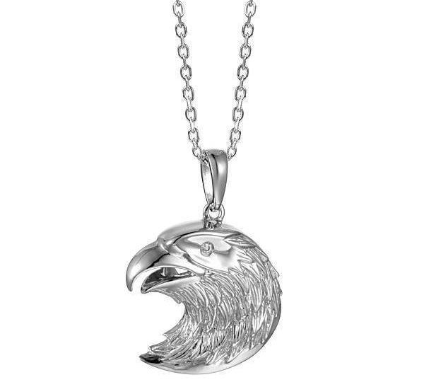 In this photo there is a sterling silver bald eagle pendant with one topaz gemstone.