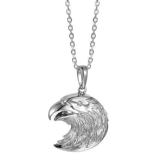 In this photo there is a sterling silver bald eagle pendant with one topaz gemstone.