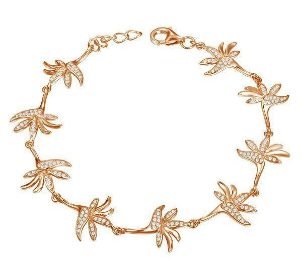 In this photo there is a rose gold plated bird of paradise bracelet with topaz gemstones.