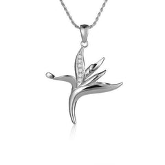 In this photo there is a small white gold bird of paradise pendant with diamonds.