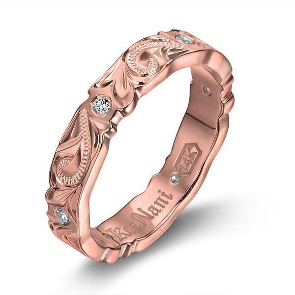 The picture shows a 14K rose gold wave infinity ring with diamonds and hand engravings.
