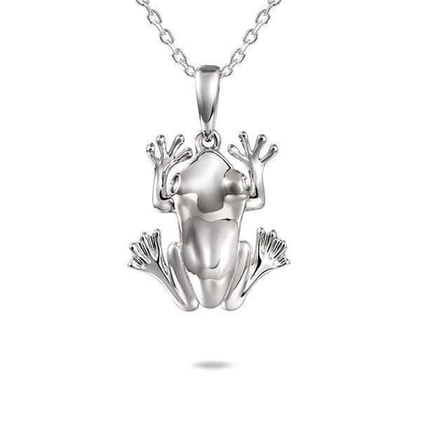 In this photo there is a sterling silver coqui frog pendant with topaz gemstones.
