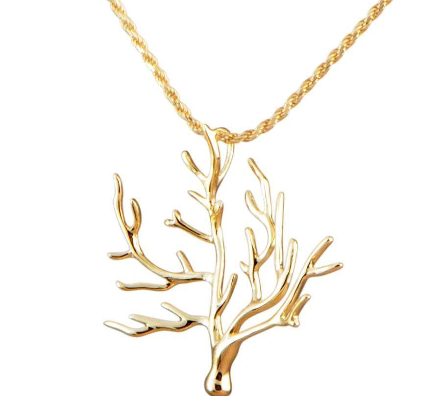 The picture shows a 14k yellow gold coral pendant.