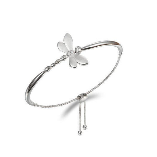 In this photo there is a sterling silver dragonfly bracelet with topaz gemstones.