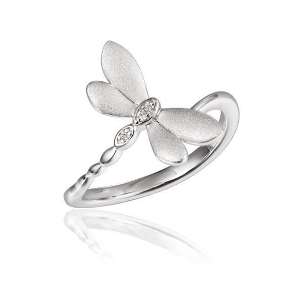 In this photo there is a 925 sterling silver dragonfly ring with topaz gemstones.