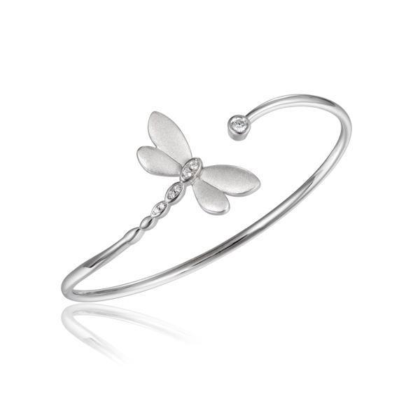 In this photo there is a sterling silver dragonfly bangle with topaz gemstones.