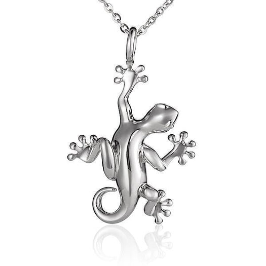 In this photo there is a sterling silver gecko pendant.