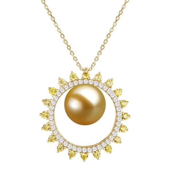 In this photo there is a yellow gold sun pendant with one golden south sea pearl and white and yellow diamonds.
