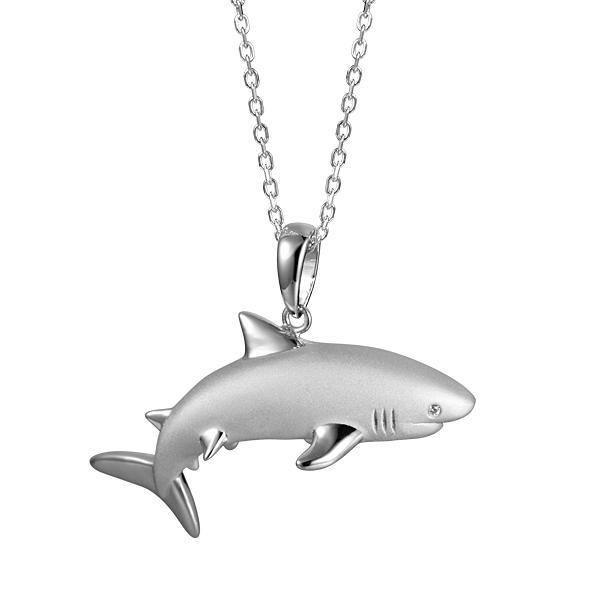 The picture shows a 925 sterling silver great white shark pendant with cubic zirconia..