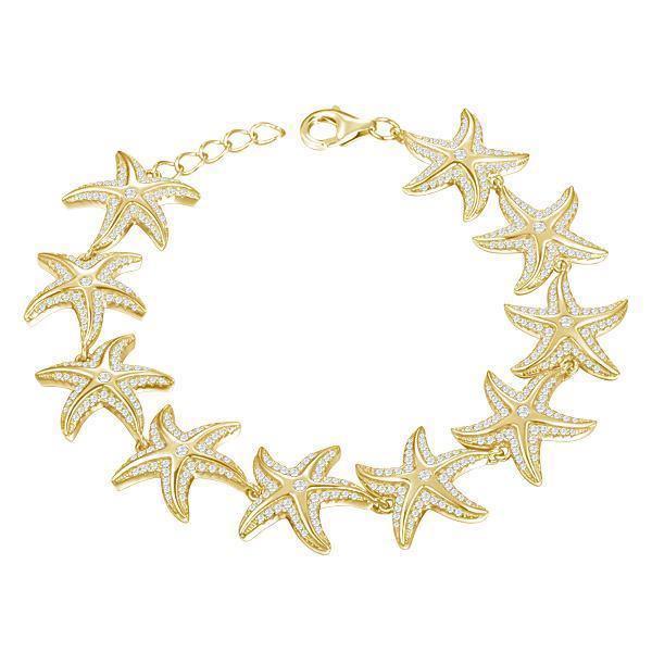 The picture shows a 925 sterling silver yellow gold-plated starfish bracelet with topaz.