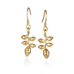 In this photo there is a pair of 14k yellow gold heliconia flower hook earrings.