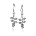 In this photo there is a pair of 14k white gold heliconia flower hook earrings.