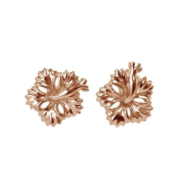 In this photo there is a pair of 14k rose gold hibiscus stud earrings.