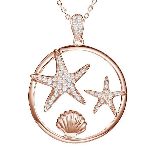 The picture shows a 14K rose gold starfish and shell pendant with diamonds.