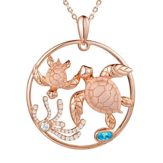 The picture shows a 925 sterling silver, rose gold plated, eternity pendant with two sea turtles and seaweed with  aquamarine.
