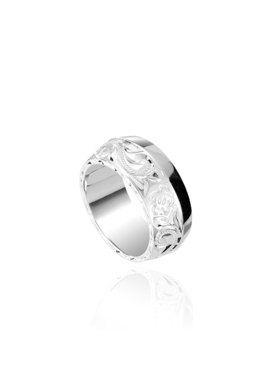 The picture shows a 925 sterling silver 8mm ring with hand engravings including sea turtles.