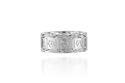 The picture shows a 925 sterling silver 8mm ring with hand engravings including sea turtles